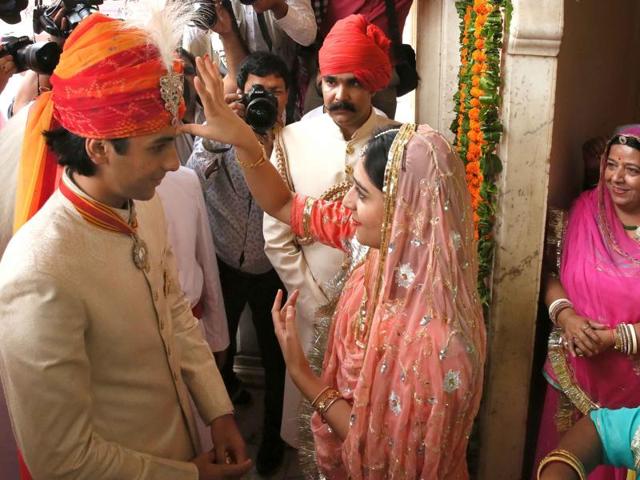 Padmanabh Singh is greeted by his sister Gaurvi Kumari at his 18th birthday celebrations. (Himanshu Vyas/HT Photo) 