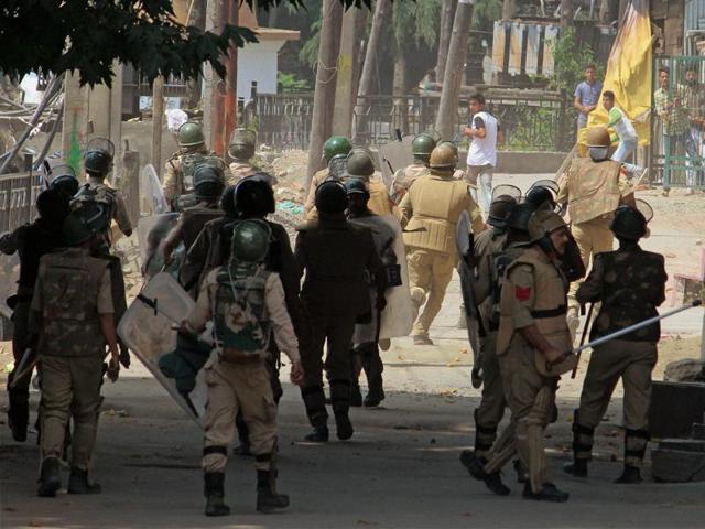 CRPF personnel face-off with protesters throwing stones at them in Srinagar. The killing of a militant leader has sparked clashes between protesters and security forces in which 30 people have died. (PTI) CRPF personnel face-off with protesters throwing stones at them in Srinagar. The killing of a militant leader has sparked clashes between protesters and security forces in which 30 people have died. (PTI)