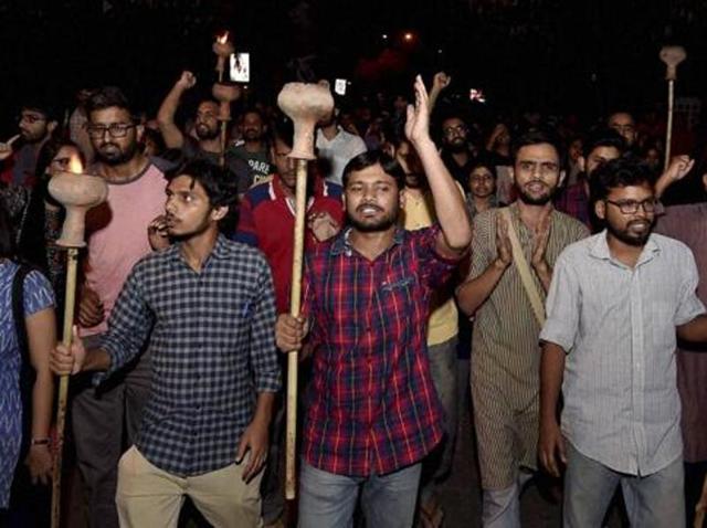 JNUSU president Kanhaiya Kumar and student leader Umar Khalid participate in a protest march at JNU campus.(PTI File PHoto)