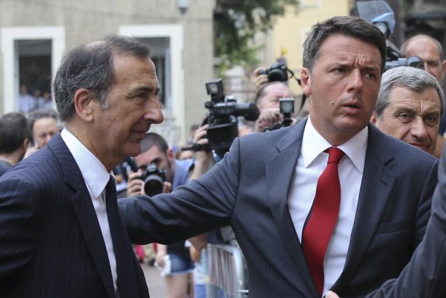 Italian premier Matteo Renzi (right) is flanked by Milan's mayor Matteo Sala. Renzi said the train crash "is a moment of tears". (AP Photo) Italian premier Matteo Renzi (right) is flanked by Milan's mayor Matteo Sala. Renzi said the train crash "is a moment of tears". (AP Photo)