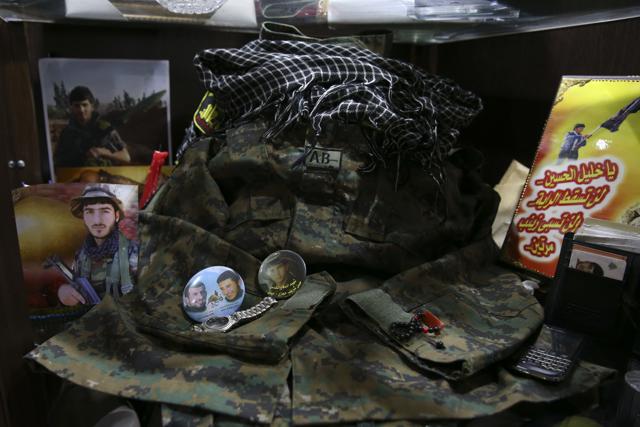 Belongings of slain Hezbollah fighter Khalil Ibrahim, who was killed in Syria, are seen in a special closet at his parents home, in the southern village of Aynata, close to the town of Bint Jbail, Lebanon. (AP) Belongings of slain Hezbollah fighter Khalil Ibrahim, who was killed in Syria, are seen in a special closet at his parents home, in the southern village of Aynata, close to the town of Bint Jbail, Lebanon. (AP)