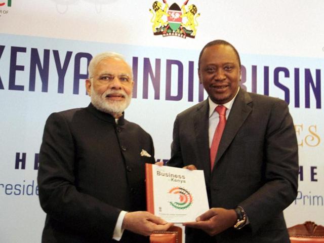 Prime Minister, Narendra Modi presents a guide for Indian Businesses: "Doing Business in Kenya" to the President of Kenya, Uhuru Kenyatta, at the India-Kenya Business Forum, at Nairobi in Kenya on Monday.(PTI)
