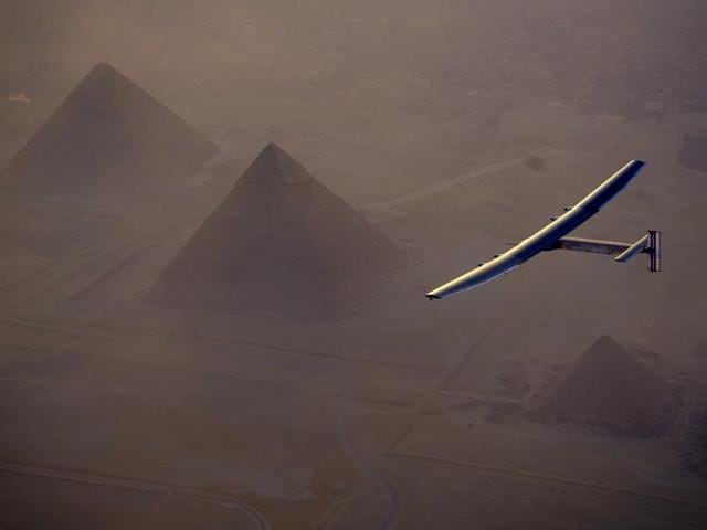 In this Wednesday, July 13, 2016, handout image provided by Solar Impulse, the Solar Impulse 2 flying over the pyramids, Egypt Cairo. (AP Photo)