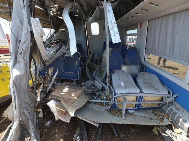 Officials inspect the train crash site near Corato, in the southern Italian region of Puglia. (AFP) Officials inspect the train crash site near Corato, in the southern Italian region of Puglia. (AFP)