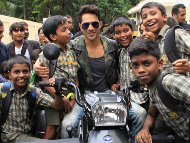 A lot of young fans surrounded Varun as he posed for photographs. (IANS) A lot of young fans surrounded Varun as he posed for photographs. (IANS)