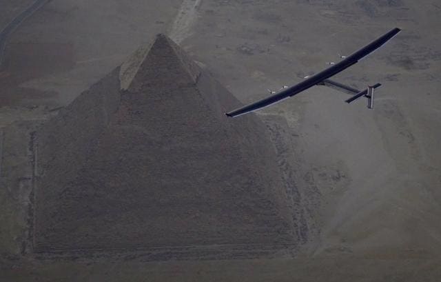 Solar Impulse 2, the solar powered plane, piloted by Swiss pioneer Andre Borschberg is seen during the flyover of the pyramids of Giza on Wednesday prior to the landing in Cairo, Egypt. (Reuters) Solar Impulse 2, the solar powered plane, piloted by Swiss pioneer Andre Borschberg is seen during the flyover of the pyramids of Giza on Wednesday prior to the landing in Cairo, Egypt. (Reuters)
