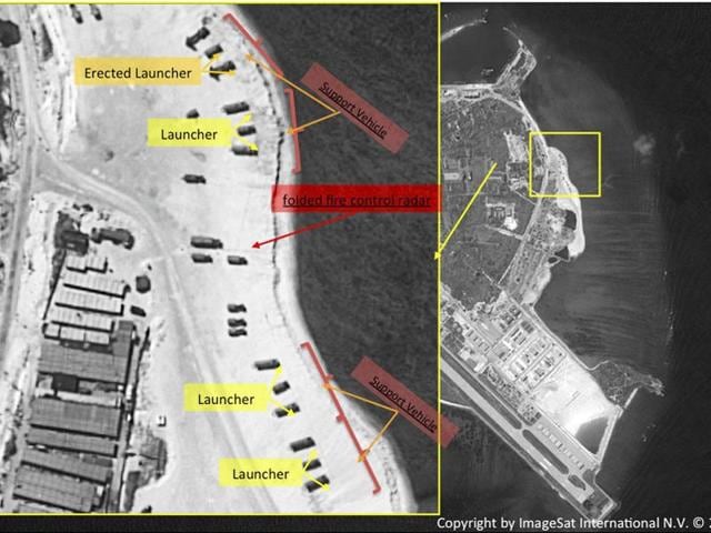 This image with notations provided by ImageSat International NV shows satellite images of Woody Island, the largest of the Paracel Islands, in the South China Sea.(AP) This image with notations provided by ImageSat International NV shows satellite images of Woody Island, the largest of the Paracel Islands, in the South China Sea.(AP)