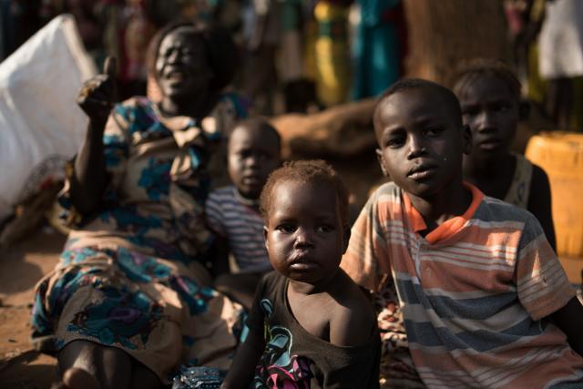 Families take shelter at Saint Joseph's church compound in Juba. (AFP Photo) Families take shelter at Saint Joseph's church compound in Juba. (AFP Photo)