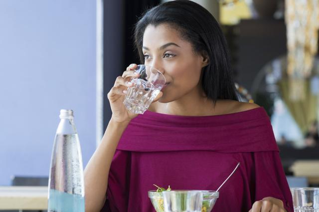 Avoid drinking water with meals as it dilutes the digestive enzymes present in stomach. Drink water 10 minutes before or after food. (iStock) Avoid drinking water with meals as it dilutes the digestive enzymes present in stomach. Drink water 10 minutes before or after food. (iStock)