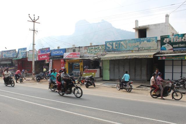 A view of the Ardhanareeswarar temple atop the hillock in the background at Tiruchengode. (Photo: Sandhya Ravishankar) A view of the Ardhanareeswarar temple atop the hillock in the background at Tiruchengode. (Photo: Sandhya Ravishankar)