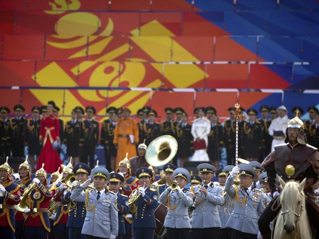 In 2010, Naadam was included in the representative list of the Intangible Cultural Heritage of Humanity of UNESCO. A marching band performs in front of a giant display of the Mongolian flag. (AP) In 2010, Naadam was included in the representative list of the Intangible Cultural Heritage of Humanity of UNESCO. A marching band performs in front of a giant display of the Mongolian flag. (AP)