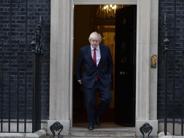 Newly appointed foreign secretary Boris Johnson leaves 10 Downing Street in central London on July 13, 2016 after new British Prime Minister Theresa May took office.(AFP Photo)
