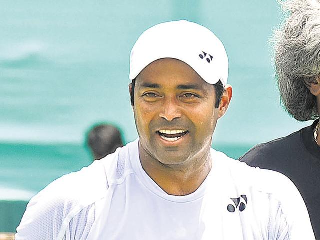 Leander Paes and Anand Amritraj (in black) during a practice session ahead of the India-South Korea Davis Cup tie at the Chandigarh Club on Wednesday.(Sanjeev Sharma/HT Photo) Leander Paes and Anand Amritraj (in black) during a practice session ahead of the India-South Korea Davis Cup tie at the Chandigarh Club on Wednesday.(Sanjeev Sharma/HT Photo)