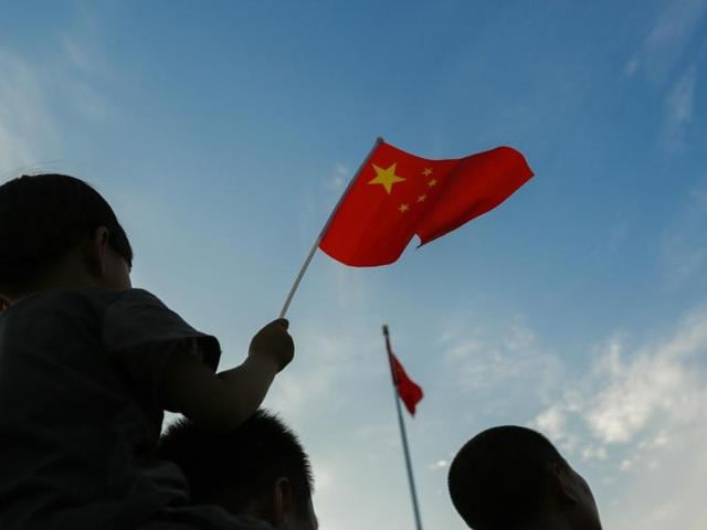 Pro-Beijing protesters shout slogans against the United States supporting an international court ruling of the South China Sea outside the US Consulate in Hong Kong. (AP) Pro-Beijing protesters shout slogans against the United States supporting an international court ruling of the South China Sea outside the US Consulate in Hong Kong. (AP)