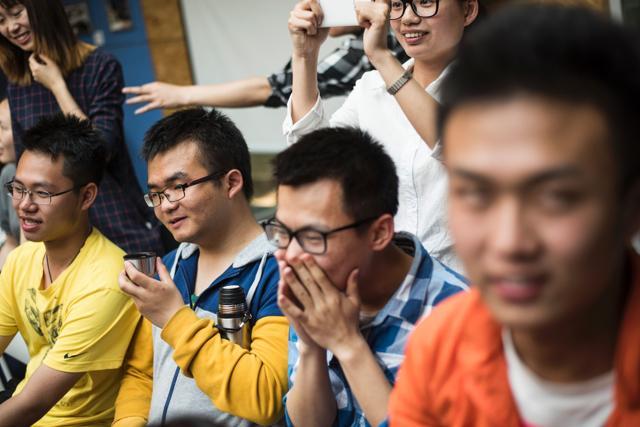 Chinese students having a laugh as they attend a course taught by Xie Shu. (AFP) Chinese students having a laugh as they attend a course taught by Xie Shu. (AFP)