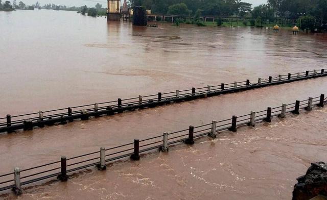 The submerged old bridge over Panchganga River after heavy rains at Ichalkaranji in Kolhapur. (PTI) The submerged old bridge over Panchganga River after heavy rains at Ichalkaranji in Kolhapur. (PTI)