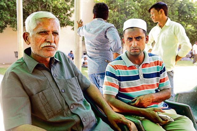 Afzaal Ahmad, brother, and Sartaz Ahmad, a son of Ikhlaq who was lynched in Bisada . Afzaal Ahmad, brother, and Sartaz Ahmad, a son of Ikhlaq who was lynched in Bisada .