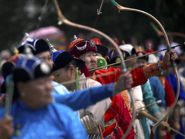 The festival also commemorates the 1921 Revolution when Mongolia declared its independence from China. Mongolian women take part in an archery competition. (AP) The festival also commemorates the 1921 Revolution when Mongolia declared its independence from China. Mongolian women take part in an archery competition. (AP)