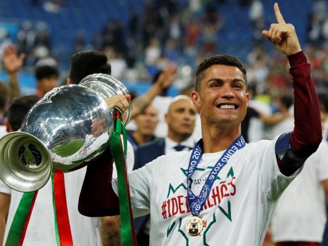 Portugal's Cristiano Ronaldo celebrates with the trophy after winning Euro 2016. (Reuters Photo) Portugal's Cristiano Ronaldo celebrates with the trophy after winning Euro 2016. (Reuters Photo)