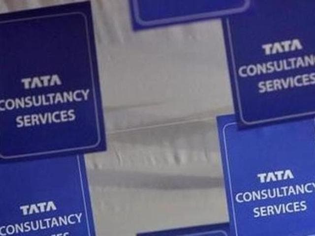 Logos of Tata Consultancy Services (TCS) are displayed at the venue of the annual general meeting in Mumbai , a few years back. (Reuters) Logos of Tata Consultancy Services (TCS) are displayed at the venue of the annual general meeting in Mumbai , a few years back. (Reuters)