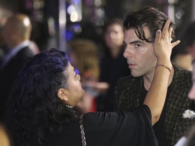 Actor Zachary Quinto, right, has his hair adjusted as he walks on the red carpet during the premiere of the film "Star Trek Beyond" in Sydney Thursday, July 7, 2016. (AP Photo/Rob Griffith) (AP) 