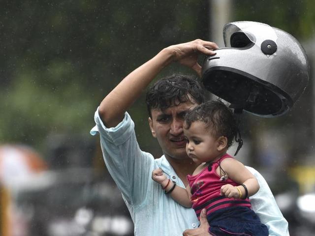 A woman enjoys the in Mumbai on Thursday. Arijit Sen/ Hindustan Times (Hindustan Times) A woman enjoys the in Mumbai on Thursday. Arijit Sen/ Hindustan Times (Hindustan Times)