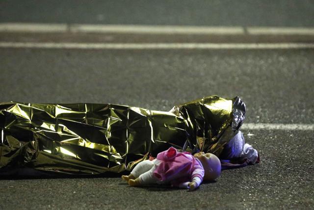 A body is seen on the ground at Promenade des Anglais. (REUTERS) A body is seen on the ground at Promenade des Anglais. (REUTERS)
