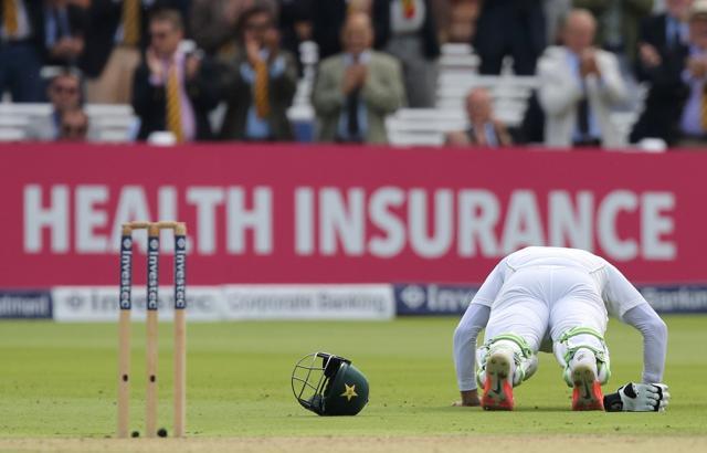 Misbah-Ul-Haq celebrates his century by doing a few press-ups. (AFP Photo) Misbah-Ul-Haq celebrates his century by doing a few press-ups. (AFP Photo)