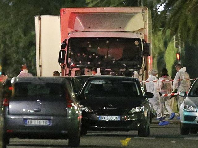 The truck which slammed into revellers late on Thursday is seen near the site of an attack in the French resort city of Nice, southern France, Friday. (AP Photo) The truck which slammed into revellers late on Thursday is seen near the site of an attack in the French resort city of Nice, southern France, Friday. (AP Photo)