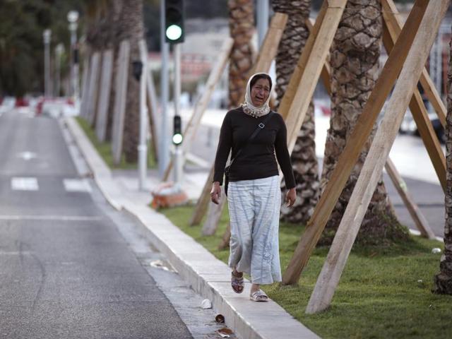 A woman cries while searching for her son as she walk near the scene of the Nice attack. (AP) A woman cries while searching for her son as she walk near the scene of the Nice attack. (AP)