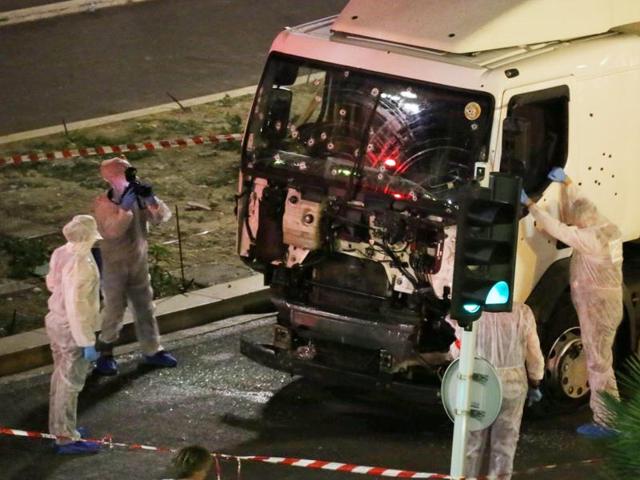 Authorities investigate the truck used in the Nice attack. (AP) Authorities investigate the truck used in the Nice attack. (AP)
