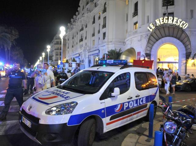 A woman cries at a memorial for victims killed in the Bastille Day tragedy in Nice. Eighty four were killed when a man drove a truck into crowds watching fireworks in the port town to mark the French National Day.(Reuters)