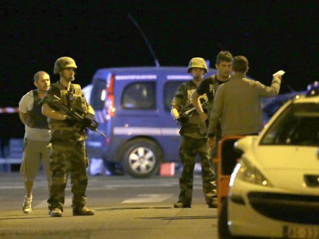 Police officers and soldiers block the access to the scene of the attack. (AP) Police officers and soldiers block the access to the scene of the attack. (AP)