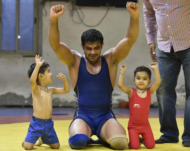 Sushil Kumar with his two -year old twins, Suvaran and Suveer, at Chhatrasal stadium in New Delhi on May 05, 2016. (Raj K Raj/ HT Photo)