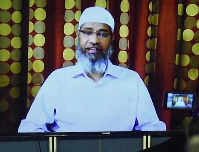 Islamic preacher Zakir Naik addresses the media through a video conference in Mumbai. (PTI Photo) Islamic preacher Zakir Naik addresses the media through a video conference in Mumbai. (PTI Photo)