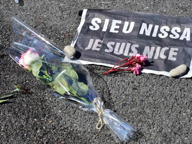 This picture taken on Saturday shows a rose and a sign reading "Je suis Nice" (I am Nice) placed near a stain on the pavement on la Promenade des Anglais in tribute to the victims of the deadly Bastille Day attack in Nice. (AFP) This picture taken on Saturday shows a rose and a sign reading "Je suis Nice" (I am Nice) placed near a stain on the pavement on la Promenade des Anglais in tribute to the victims of the deadly Bastille Day attack in Nice. (AFP)