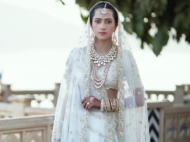 Designer Kresha Bajaj embroidered her love story on to her wedding outfit.(Instagram)