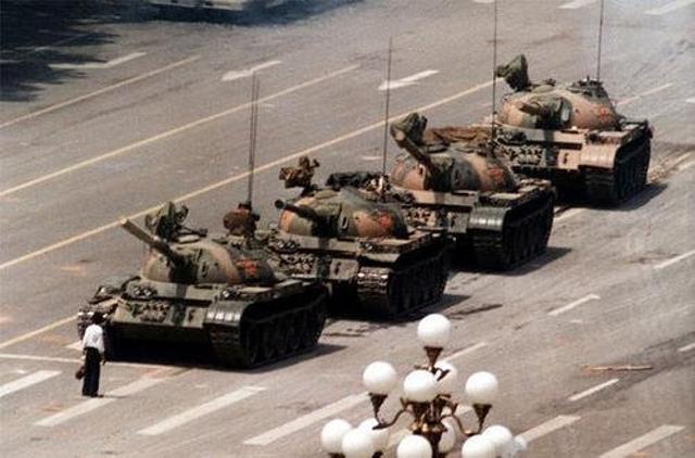 A man stands in front of a column of tanks at Tiananmen Square. (Twitter) A man stands in front of a column of tanks at Tiananmen Square. (Twitter)