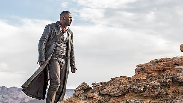 Idris Elba plays Rolan Deschain, “a sort of frontiersman knight whose primary weapon is not a sword but a pair of revolvers.” (EW)