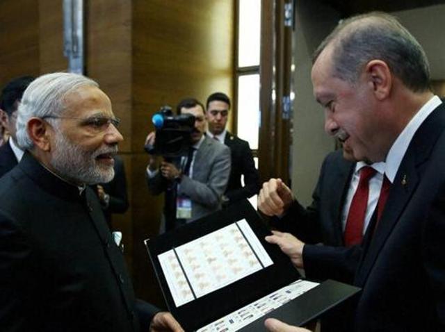 Turkish President Recep Tayyip Erdogan, right, presents a photo album to Prime Minister Narendra Modi at the end of the G-20 Summit in Antalya, Turkey. (AP File) Turkish President Recep Tayyip Erdogan, right, presents a photo album to Prime Minister Narendra Modi at the end of the G-20 Summit in Antalya, Turkey. (AP File)