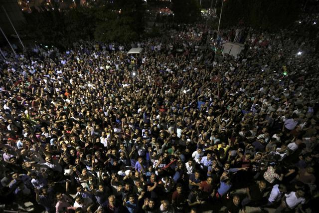 People demonstrate outside Ataturk international airport during an attempted coup in Istanbul. (REUTERS) People demonstrate outside Ataturk international airport during an attempted coup in Istanbul. (REUTERS)