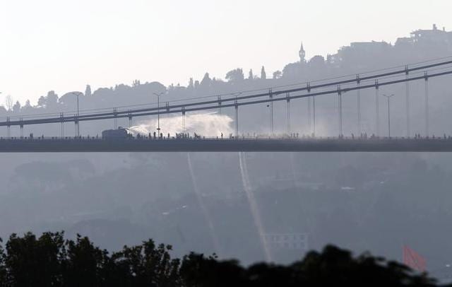 A police-armoured vehicle uses a water cannon to disperse anti-government forces on Bosphorus Bridge in Istanbul, Turkey. (Reuters Photo) A police-armoured vehicle uses a water cannon to disperse anti-government forces on Bosphorus Bridge in Istanbul, Turkey. (Reuters Photo)