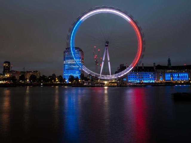 The London Eye is illuminated in blue, white and red lights, as Britons express their solidarity following the deadly attack in the southern French city of Nice. (AFP Photo) The London Eye is illuminated in blue, white and red lights, as Britons express their solidarity following the deadly attack in the southern French city of Nice. (AFP Photo)