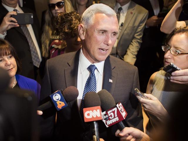 Indiana governor Mike Pence, and his wife Karen leave the Intercontinental Hotel to meet with Republican presidential candidate Donald Trump on July 15. Trump has chosen Pence as his running mate, adding political experience and conservative bona fides to his Republican presidential ticket. (AP Photo) Indiana governor Mike Pence, and his wife Karen leave the Intercontinental Hotel to meet with Republican presidential candidate Donald Trump on July 15. Trump has chosen Pence as his running mate, adding political experience and conservative bona fides to his Republican presidential ticket. (AP Photo)