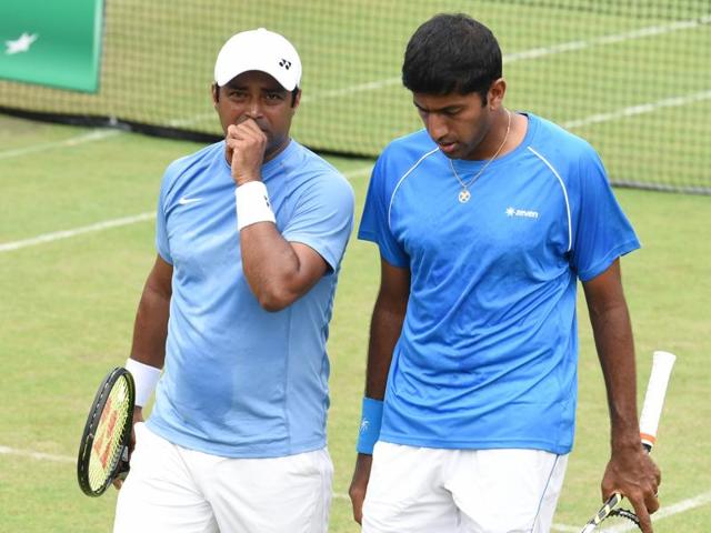 Rohan Bopanna (right) and Leander Paes ensure India take an unassailable lead in their Davis Cup tie on the low-bounding damp courts at the Chandigarh Club. (Sanjeev Sharma/ Hindustan Times) Rohan Bopanna (right) and Leander Paes ensure India take an unassailable lead in their Davis Cup tie on the low-bounding damp courts at the Chandigarh Club. (Sanjeev Sharma/ Hindustan Times)
