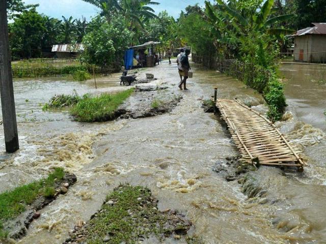 A flood hit village in Lakhimpur district of Assam on Wednesday.(PTI) A flood hit village in Lakhimpur district of Assam on Wednesday.(PTI)