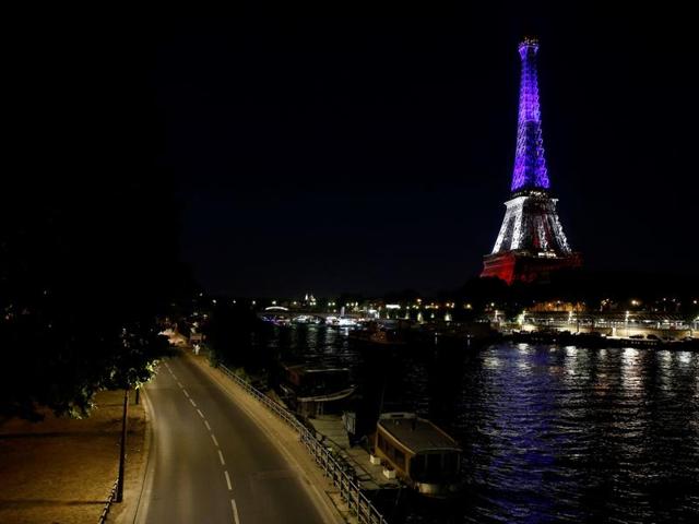 The Eiffel Tower illuminated with the colours of the French national flag in tribute for the victims of the deadly Bastille Day attack in Nice. (AFP Photo) The Eiffel Tower illuminated with the colours of the French national flag in tribute for the victims of the deadly Bastille Day attack in Nice. (AFP Photo)