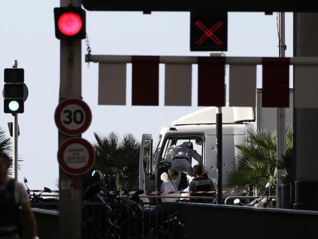 Forensic police officers work at the truck that plowed into the crowd in Nice, southern France. (AP Photo) Forensic police officers work at the truck that plowed into the crowd in Nice, southern France. (AP Photo)