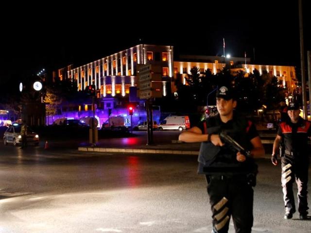 Police officers stand guard near the Turkish military headquarters in Ankara. (Reuters) 