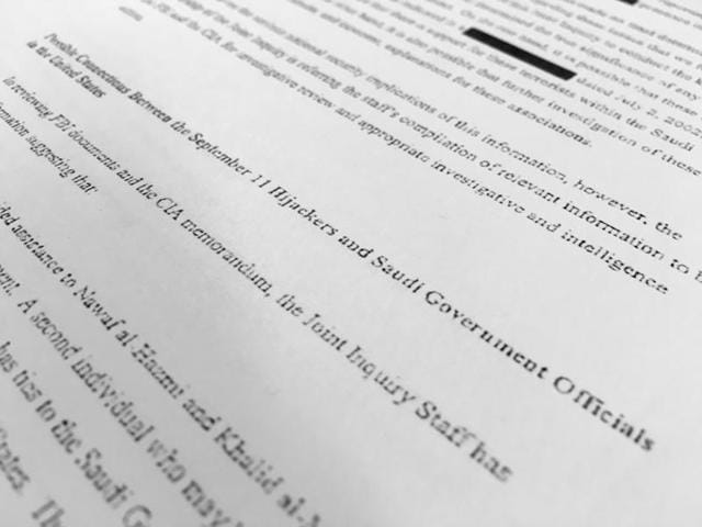 A section of one of the 28 pages from the once-top secret pages from a congressional report into 9/11 that questioned whether Saudis who were in contact with the hijackers. (AP Photo) A section of one of the 28 pages from the once-top secret pages from a congressional report into 9/11 that questioned whether Saudis who were in contact with the hijackers. (AP Photo)